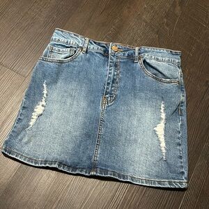 Forever 21 women’s Jean skirt, size 29, ripped detailing
